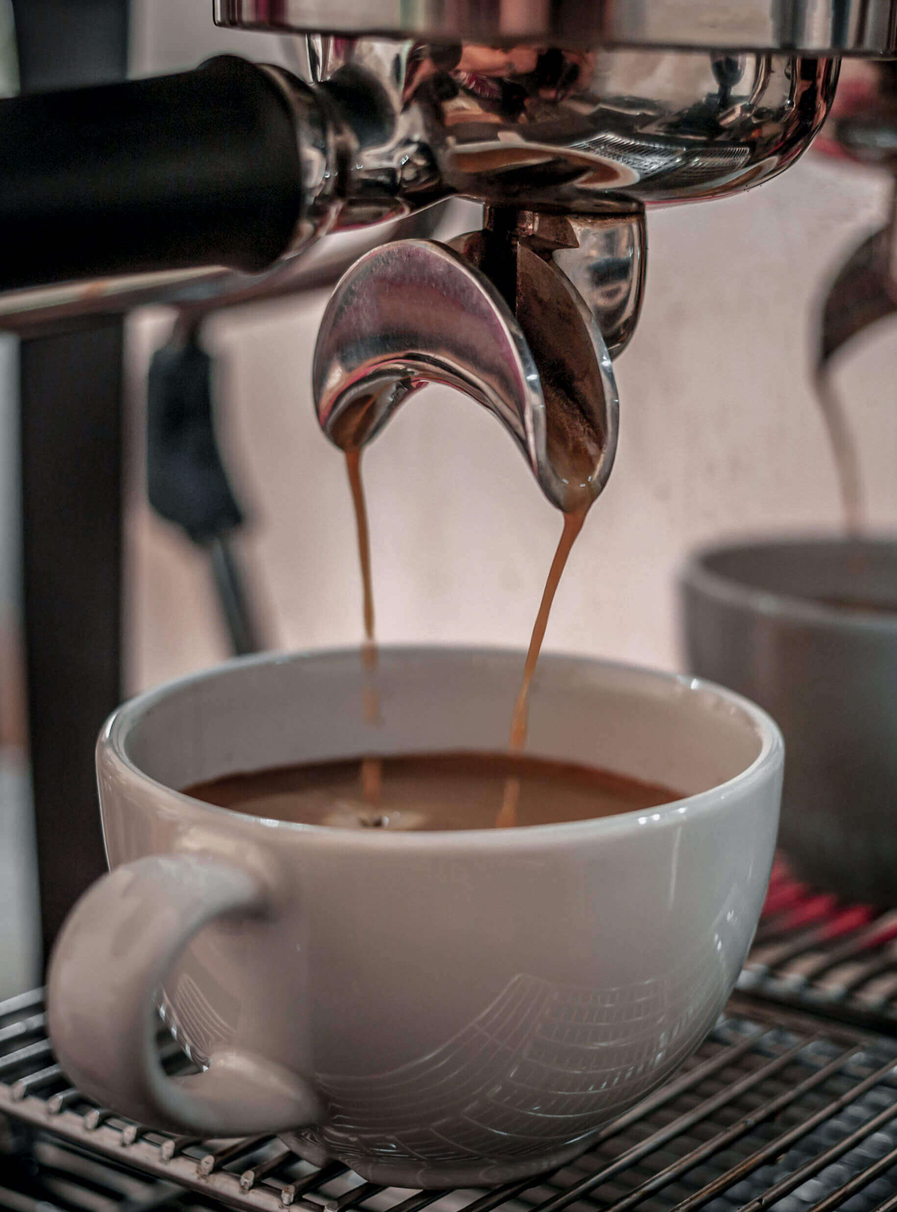 Espresso maker pouring the perfect shot.